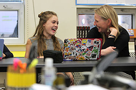 Photo of happy student and teacher. Link to Closely Held Business Stock